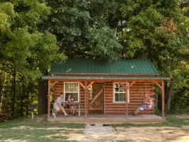a house with trees in the background