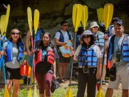 a group of people posing for the camera