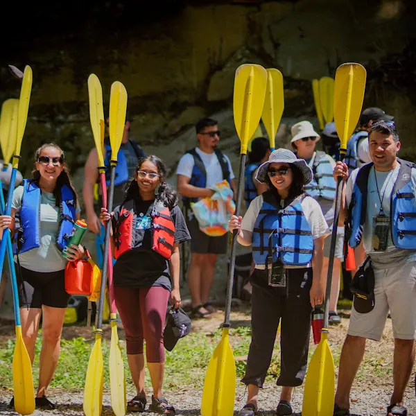 a group of people posing for the camera